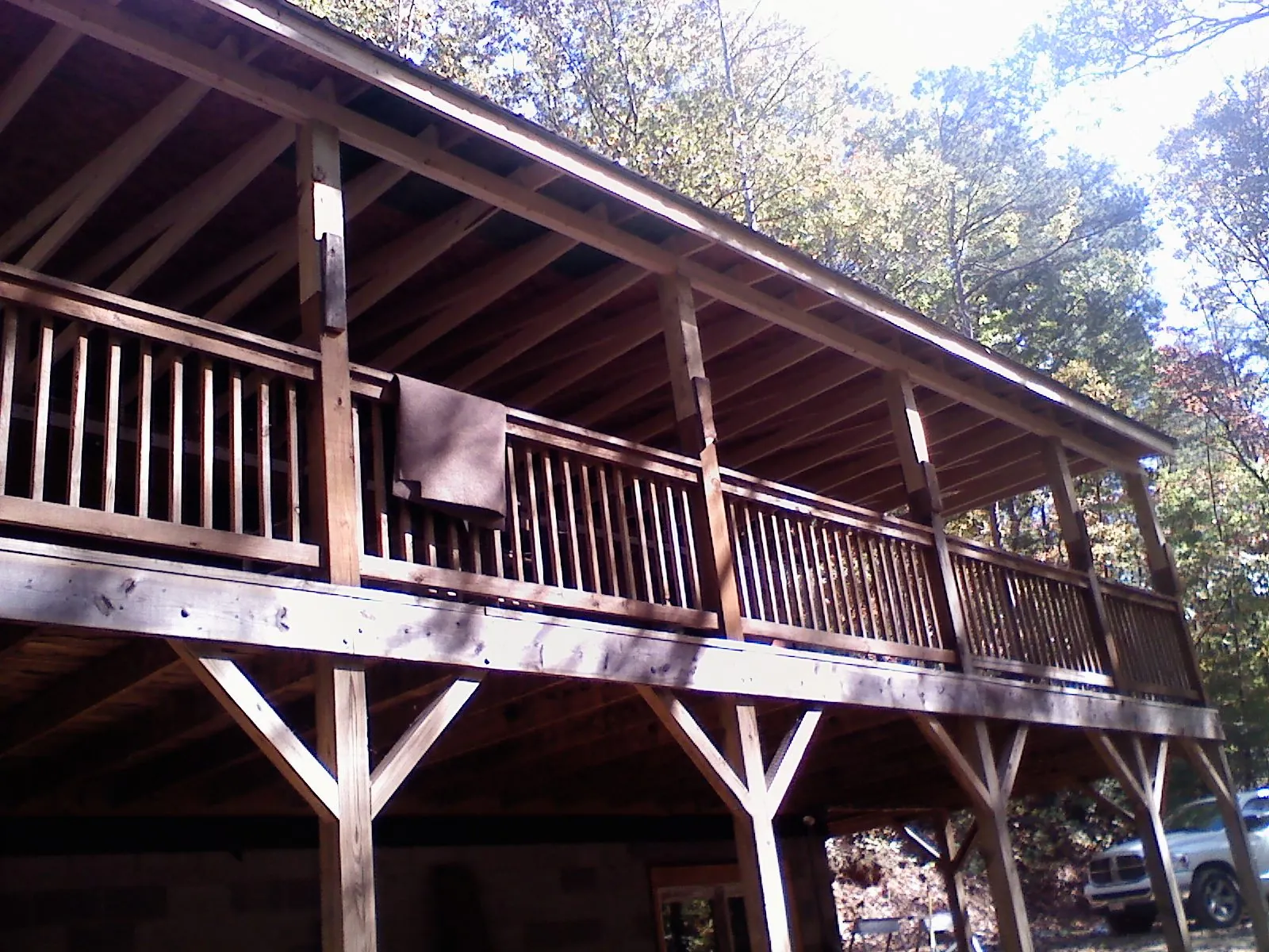 Timber framing under a new elevated porch and deck — Roof Leak Repair in Henning by Roofing Brothers